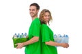 Two smiling activists holding box of recyclables and standing ba Royalty Free Stock Photo