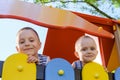 Happy children having fun on playground Royalty Free Stock Photo