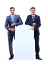 Two smiling business man showing blank signboard Royalty Free Stock Photo