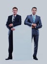 Two smiling business man showing blank signboard, isolated over white background. Royalty Free Stock Photo