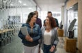 Smiling businesswoman talking together while walking down an office hallway Royalty Free Stock Photo