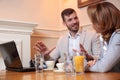 Two smiling business partners meeting in a cafe during coffee break Royalty Free Stock Photo