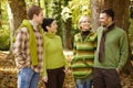 Two couples talking in autumn forest Royalty Free Stock Photo