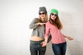 Two Smiling Fashion Hipster Girls in Spring Royalty Free Stock Photo