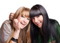 Two smiling girl-friends Royalty Free Stock Photo