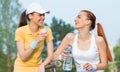 Two smiling girl friends in sports clothing Royalty Free Stock Photo