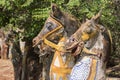 Two smiling horse heads.