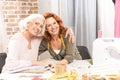 Two smiling seamstresses Royalty Free Stock Photo