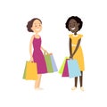 Two smiling young girlfriends is return from mall shopping Royalty Free Stock Photo
