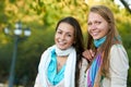 Two smiling young girls outdoors Royalty Free Stock Photo