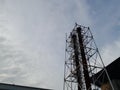 Two smokestacks of the steam power plant, which soared high into the sky.