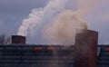 Two smoking chimneys Royalty Free Stock Photo