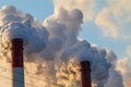 Two Smoking factory chimneys Royalty Free Stock Photo