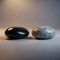 On a neutral background. The stone on the left is black, with a Royalty Free Stock Photo