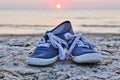 Two sneakers at the beach Royalty Free Stock Photo