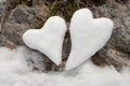 Two snow hearts on rock Royalty Free Stock Photo