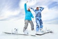 Two snowboard rider girls