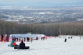 Arsenyev, Russia, January, 28, 2017. Two snowboarders siting on the teaching slope. Ski resort in the town of Arsenyev.