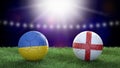 Two soccer balls in flags colors on stadium blurred background. Ukraine and England