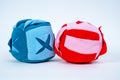 Two soft textile washable snuffle toys in shape of cube and pyramid to hide dried treats in pockets for dogs nose work