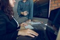 Two software developers are analyzing together about the code written into the program on the computer Royalty Free Stock Photo