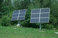 Two solar pannel in fores. Renewable energy and ecology Royalty Free Stock Photo