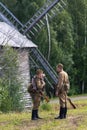 Two Soviet soldiers of the second world war near the windmill