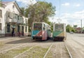 Two soviet streetcars at street stop. Temirtau, Kazakhstan