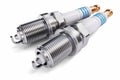 Two spark plugs on a white background Royalty Free Stock Photo