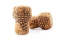 Two sparkling wine corks with grape images on white background Royalty Free Stock Photo