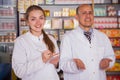 Two specialists in drugstore Royalty Free Stock Photo