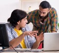 Two it specialists working in the office Royalty Free Stock Photo