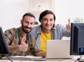Two it specialists working in the office Royalty Free Stock Photo