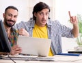 Two it specialists working in the office Royalty Free Stock Photo