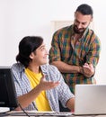 Two it specialists working in the office Royalty Free Stock Photo