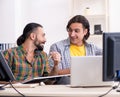 Two it specialists working in the office Royalty Free Stock Photo