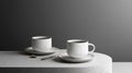 Two Speckled White Coffee Cups on a Textured Table Royalty Free Stock Photo
