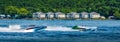 Two speedboats racing on a river in the summer Royalty Free Stock Photo
