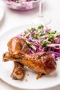 Two Spicy Glazed Roasted Chicken Drums with Salad