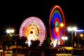 Two spinning Farris wheels in Gdynia Royalty Free Stock Photo