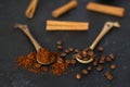 two spoons with coffee on a black background. Royalty Free Stock Photo