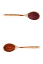 Two spoons with spices Royalty Free Stock Photo