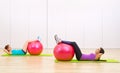 Two sporty girls at fitness club Royalty Free Stock Photo