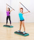 Two sporty girls at fitness club Royalty Free Stock Photo