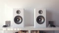 Two square white canvas Mockups hanging on the wall, hi fi micro system on bureau,3d rendering Royalty Free Stock Photo