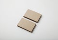 Two stack of blank craft business cards on white background with soft shadows.