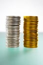 Two stack of silver and gold coins Royalty Free Stock Photo