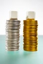 Two stack of silver and gold coins Royalty Free Stock Photo