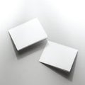 Two stacks of blank white paper on a light gray background Royalty Free Stock Photo