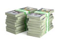 Two Stacks of bundles of 100 US dollars isolated on white